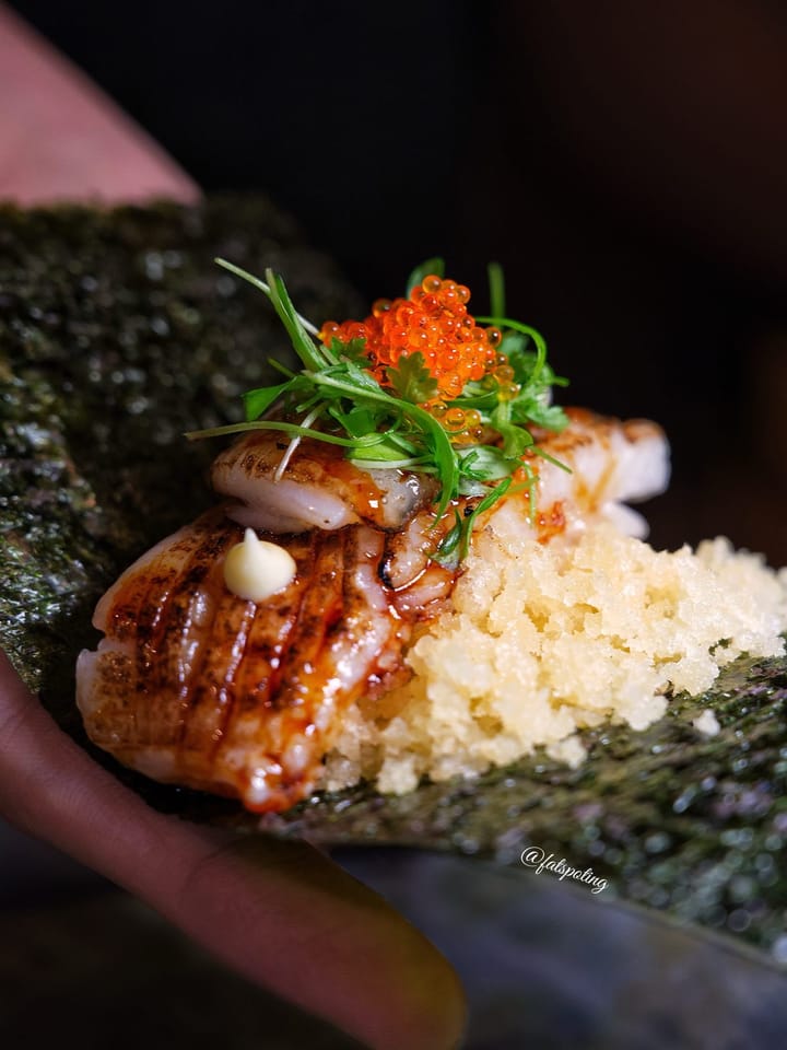 Rolls Handroll Izakaya is one of those places where sitting at the